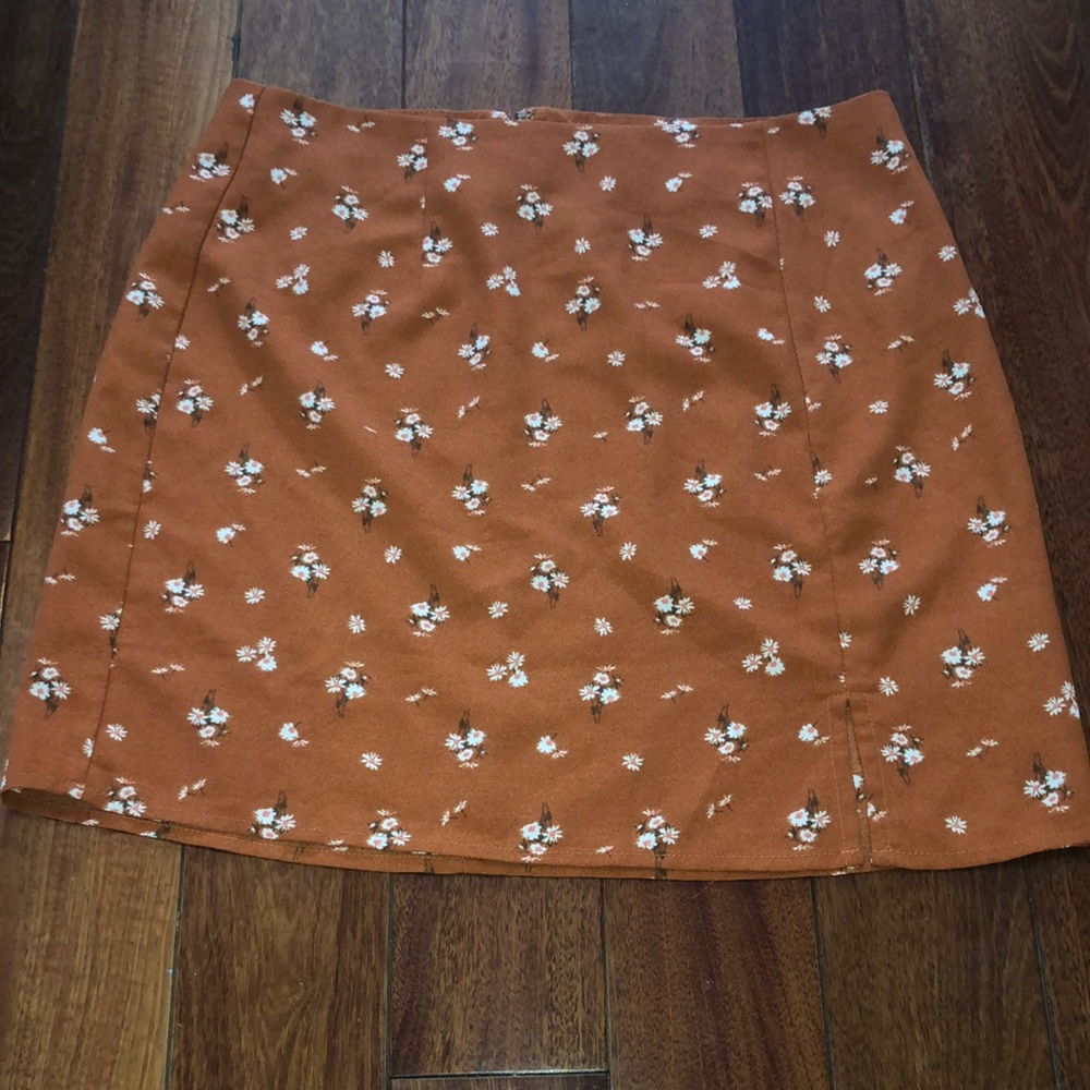 Orange floral mini skirt